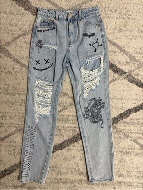 Adika Light Blue Distressed Boyfriend Jeans with Black Graphics
